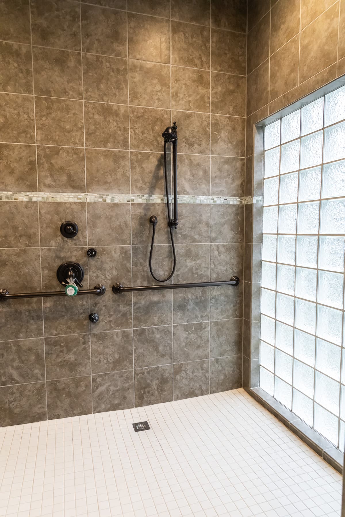 Multi-headed Shower and Glass Block Wall in Wet Room